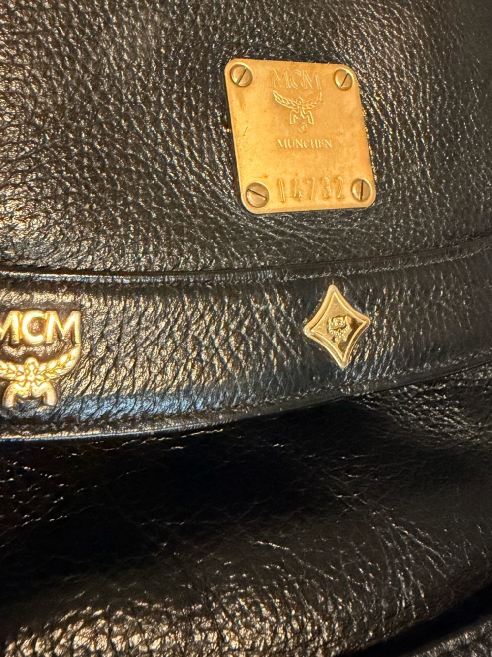 MCM Black Leather Backpack with Gold Logo Accents - Picture 10 of 11